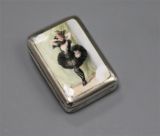 A late Victorian silver and enamel vesta case, decorated with a dancing lady, George Heath, London, 1890 (a.f.), 57mm.